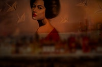 a painting of a woman in a red dress